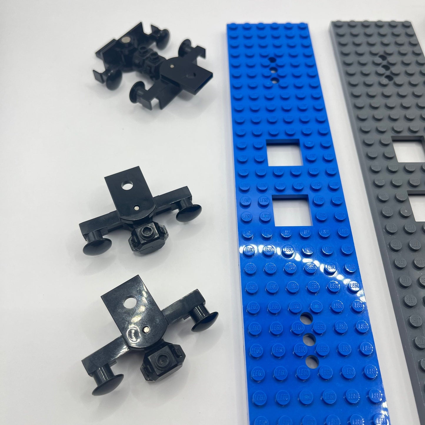 LEGO Train Base 6x28, Buffers and Wheel Holders, 11 Pieces.